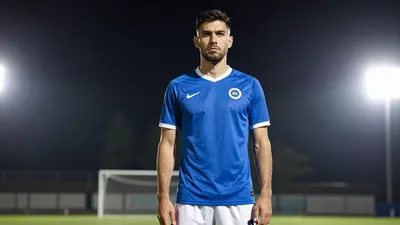A photorealistic image of an anonymous ÖFK player, aged 25-30, with a serious expression, wearing a blue jersey and white...