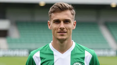 A photorealistic image of an anonymous Sidsjö-Böle player in a green and white jersey, with a sharp focus on the eyes and...